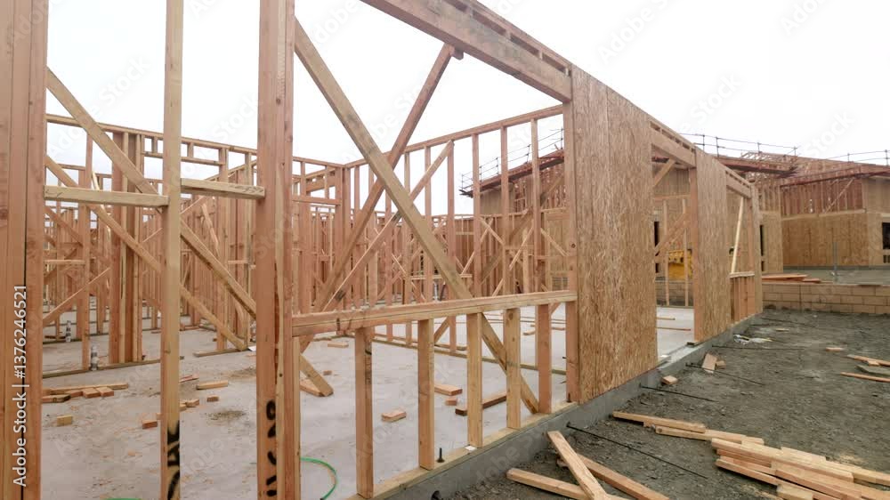 Slow Motion Panning Movement of A New Home Construction Site. Slow Motion Panning Movement of A New Home Construction Site.