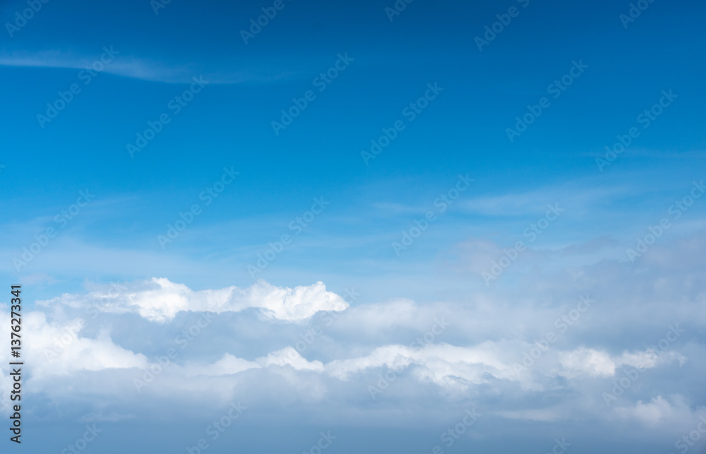 Naklejka premium Blue Sky with White Clouds, Flying above Sunny Cloudy Sky Texture Pattern Plane View