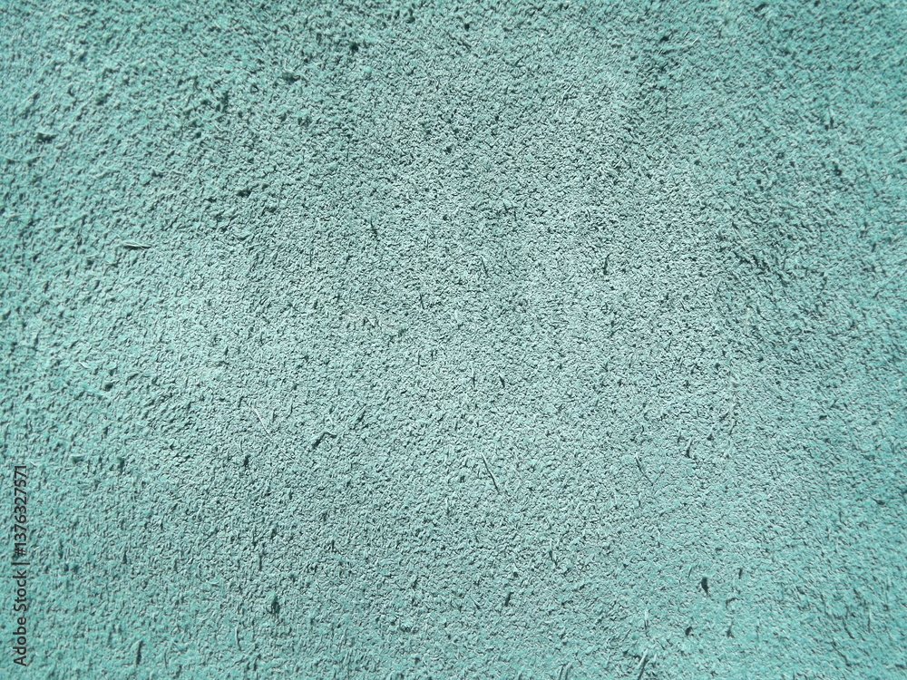 Obraz premium Genuine leather and genuine suede turquoise blue close-up as background