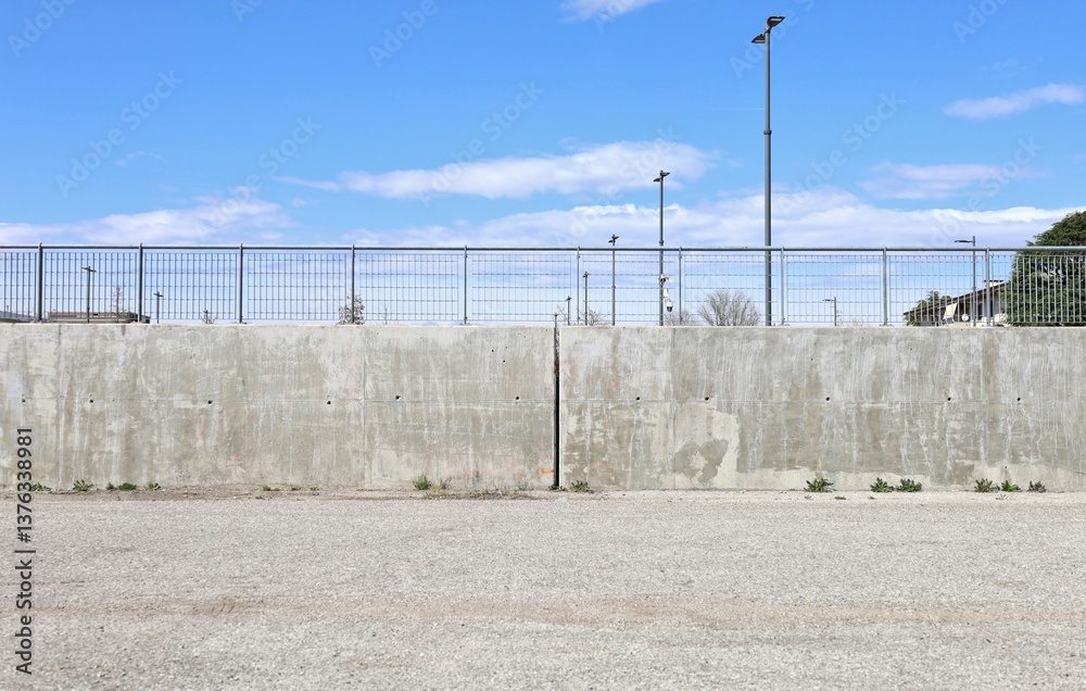 custom made wallpaper toronto digitalLong concrete surrounding wall with grid pattern railing on top. Streetlight and sky on behind, street in front. Background for copy space.