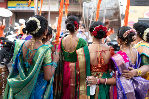 Bild auf Leinwand Mumbai , India -  30 March 2025 On the day of Gudi Padwa women have come to participate in the Shobha Yatra wearing Marathi traditional dress saree