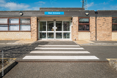Obraz na płótnie Outside view of a main entrance of a typical NHS hospital in Britain