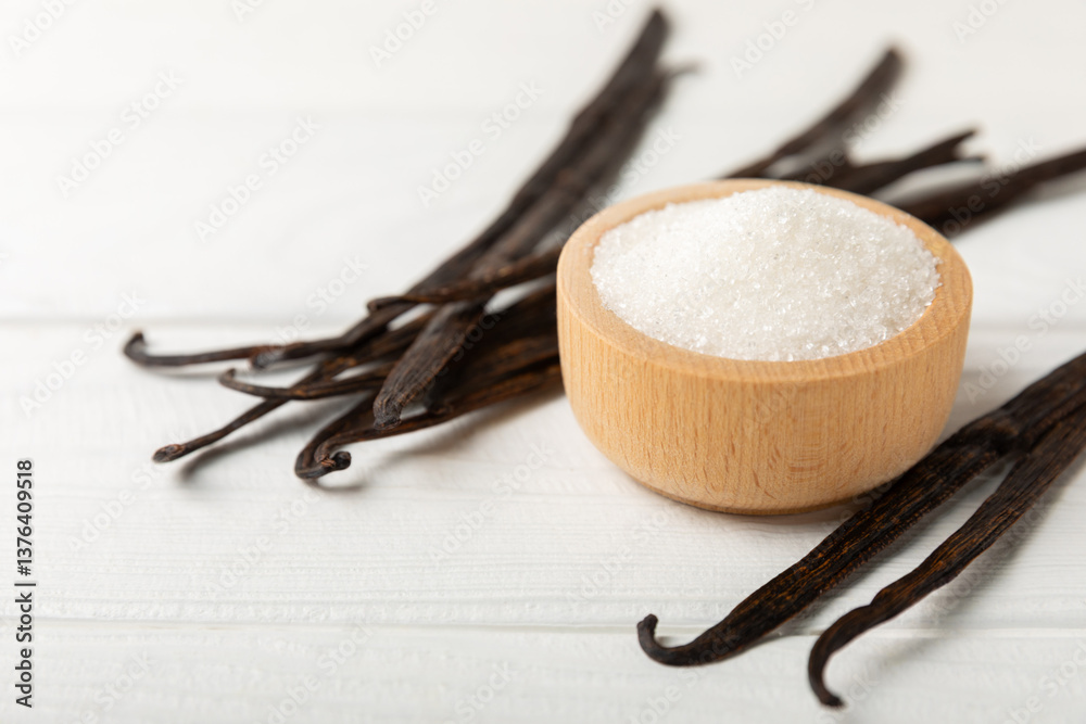 Fototapeta premium Aromatic vanilla sugar. Vanilla pods. Vanilla sticks, brown and white sugar in a bowl on a textured background. Vanilla flowers, spices and herbs for desserts and baking. Space for text. Copy space