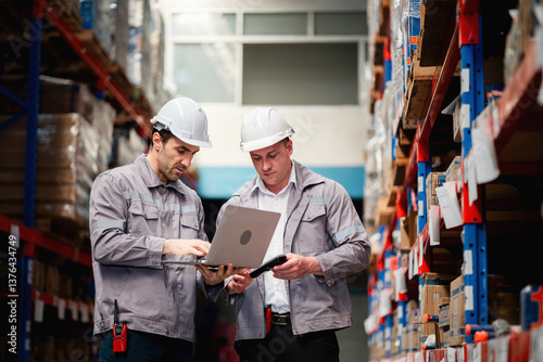 Warehouse supervisors and workers are inspecting goods in the warehouse.