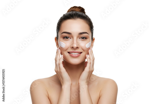 Woman happily using beauty products for skincare routine.