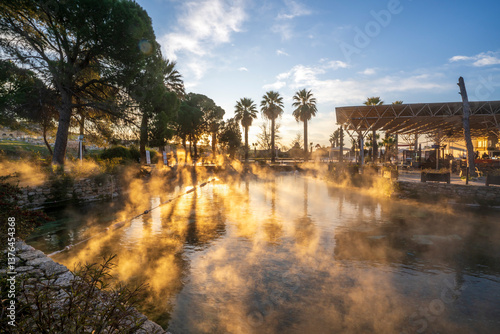 The Antique pool (Cleopatra's Bath) view in Pamukkale. It's a popular touristic destination during a Pamukkale visit