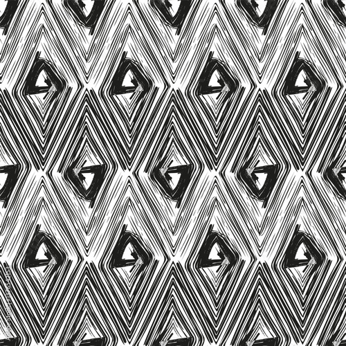 Seamless pattern with doodles collected in a geometric design. Lines drawn with pen, ink, paint.