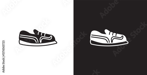 Icon of men's short shoes. Vector illustration icon of modern and classic men's sneakers. Fashion icon on black and transparent background. Fashion icon.