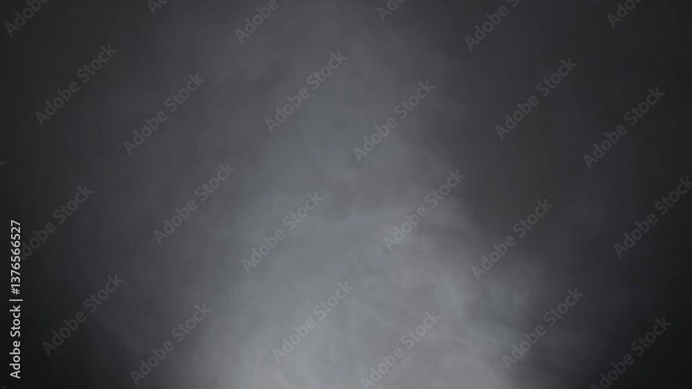 Abstract white smoke in slow motion. Smoke, Cloud of cold fog in light spot background. Light, white, fog, cloud, black background, 4k, ice smoke cloud. Floating fog.
