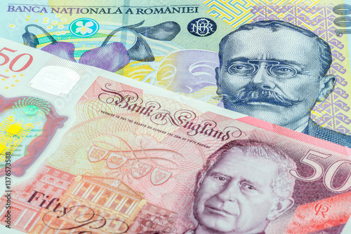 Wallpaper Mural 100 Romanian leu and 50 British pounds banknotes. International trade concept Torontodigital.ca