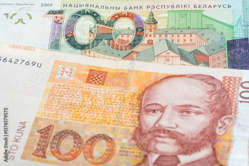 Fototapeta Naklejka Na Ścianę i Meble -  100 Belarusian ruble and 100 Croatian kuna banknotes. International trade concept