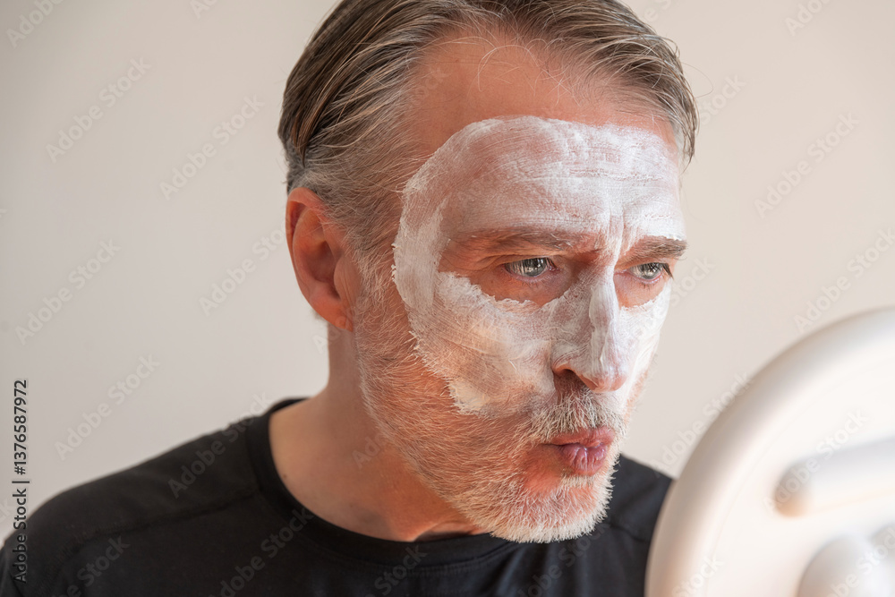 An older man grooms himself and goes through his morning routine and undergoes men's beauty treatments.