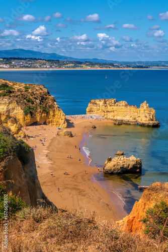 Praia Dona Ana beach Lagos, The Algarve, Portugal with golden sand and blue sea