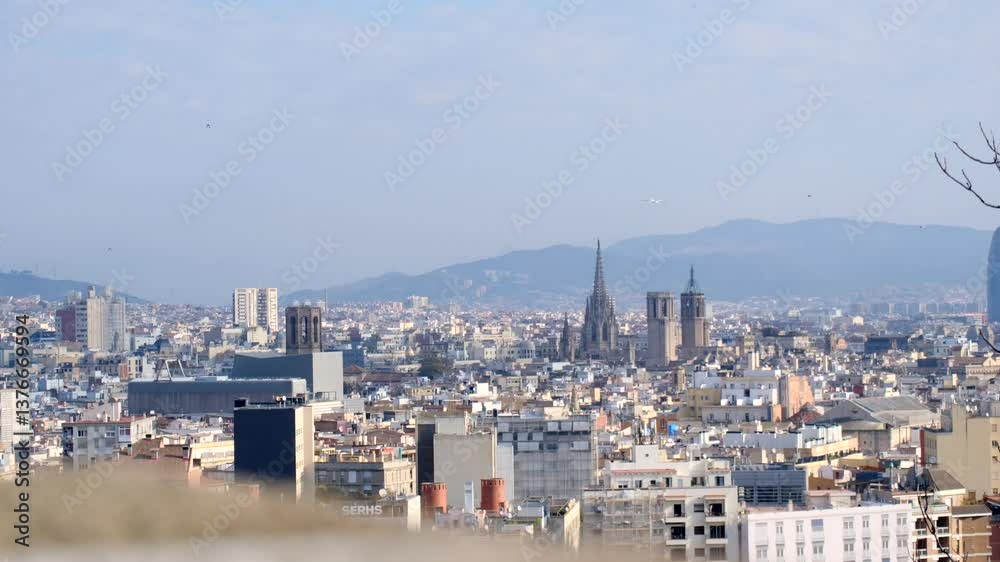 Barcelona cityscape panorama featuring the prominent landmark and distant mountains. Barcelona cityscape panorama featuring the prominent landmark and distant mountains.