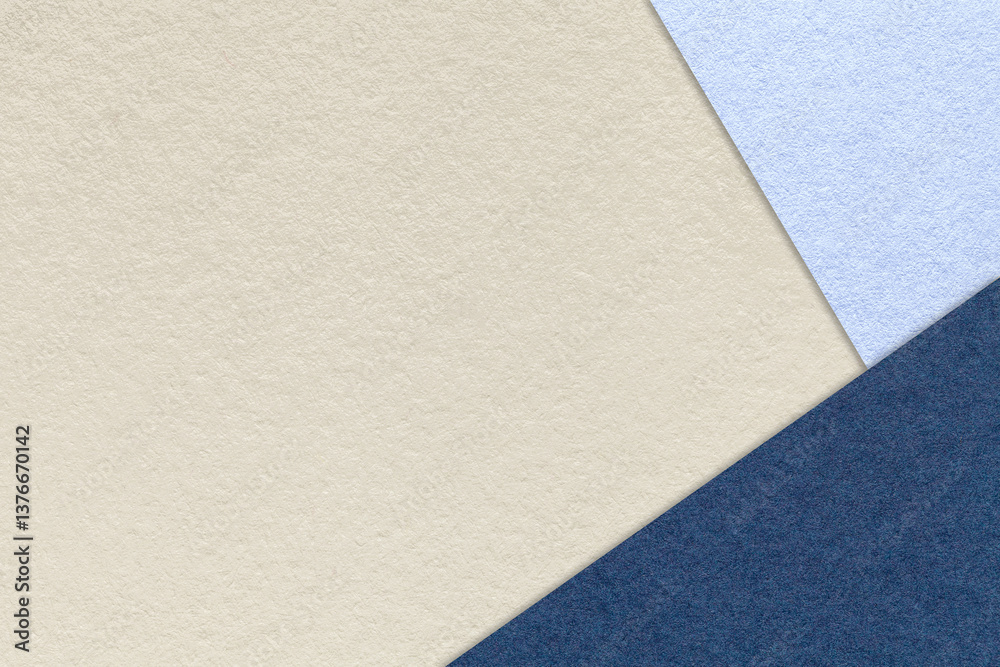 Texture of craft light beige paper background with sky and navy blue border. Vintage abstract cream cardboard. Texture of craft light beige paper background with sky and navy blue border. Vintage abstract cream cardboard.