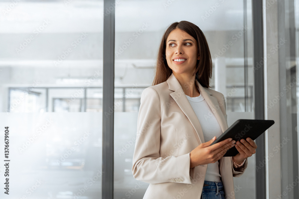 Young smiling latin hispanic woman using computer for business working application. Businesswoman professional boss holding digital tablet pc device for work in office, looking dreaming at copy space Young smiling latin hispanic woman using computer for business working application. Businesswoman professional boss holding digital tablet pc device for work in office, looking dreaming at copy space