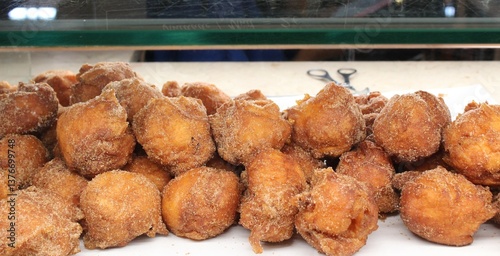 Portuguese Doughnuts (Sonhos) in a showcase