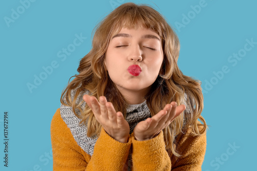 Young woman in warm scarf b...