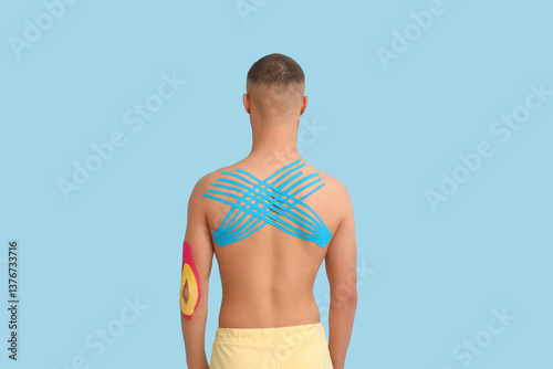 Young man with physio tape ...