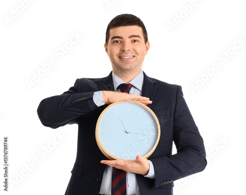 Young businessman with cloc...