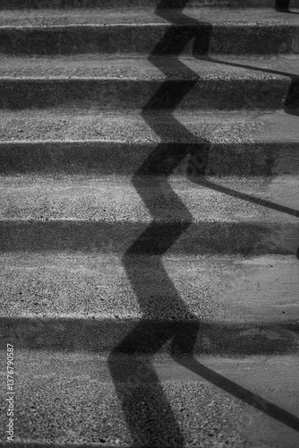 A Shadow on Concrete Stairs