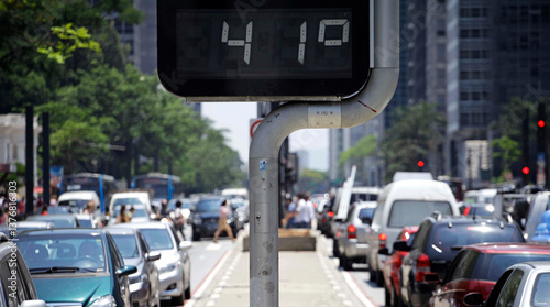Street digital thermometer measures a temperature of 41 degrees celsius in Paulista avenue, Avenida Paulista, during a extreme heat wave in Sao Paulo, Brazil.