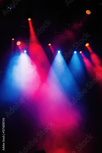 Obraz na płótnie The image captures the vibrant lighting of a concert stage, illuminating performers with red, white, and blue hues. w salonie
