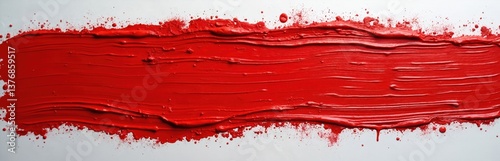 Close-up view of a thick red paint brush stroke on white canvas. Abstract art background, creative expression in vibrant colours, textured design. Artwork for decoration.