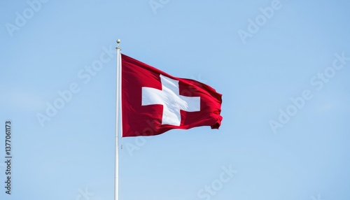 Swiss National Flag Blowing Against Clear Sky