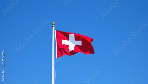 Swiss National Flag Blowing Against Clear Sky