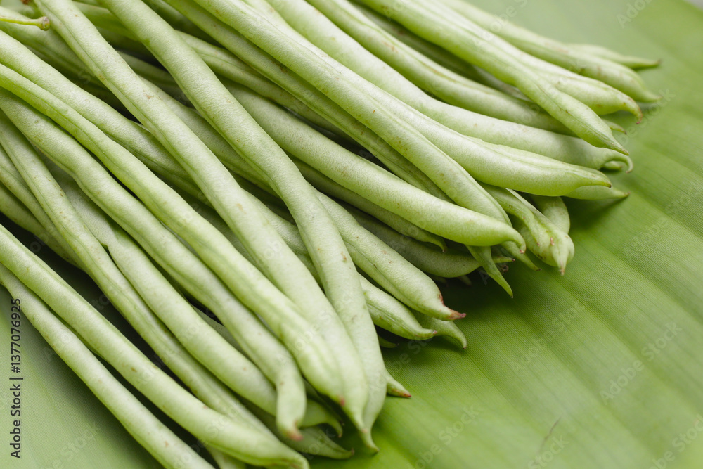 Obraz premium Fresh needle beans on white background
