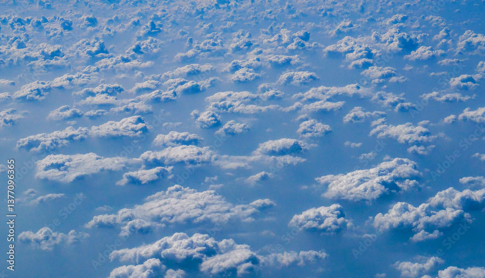 Tropical summer blue sky fluffy white cloud summertime on light sunny day cloudscape. Clear bright blue skyline spring sunlight climate background. Heaven blue environment ecology high scenic nature. Tropical summer blue sky fluffy white cloud summertime on light sunny day cloudscape. Clear bright blue skyline spring sunlight climate background. Heaven blue environment ecology high scenic nature.