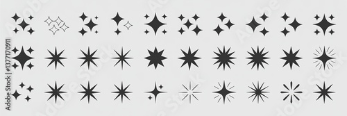 Wallpaper Mural Collection of various starburst and sparkle shapes in black on a light background. Torontodigital.ca