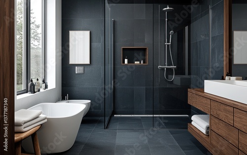 Modern bathroom interior design with dark gray stone tiles, a freestanding bathtub, and wooden vanity. Natural light from a large window illuminates the space