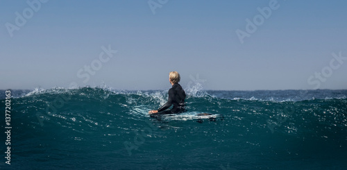 Boy waiting for a wave.