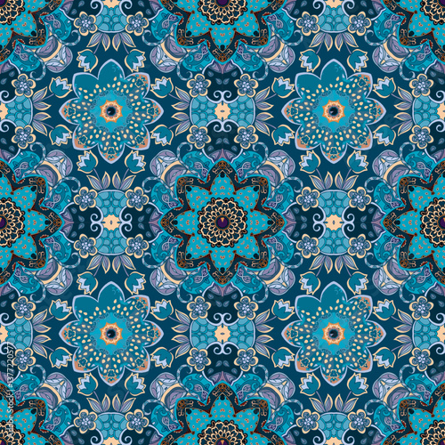 Seamless floral pattern in ethnic style. Beautiful vintage textile print in blue tones.