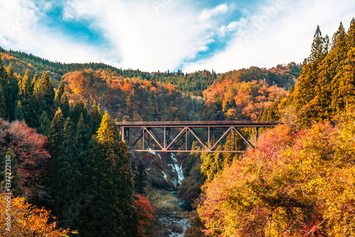 Fukushima, JAPAN - Nov 10, 2024: Tadami line railroad bridge across Tadami river near Takuya station in Fukushima
