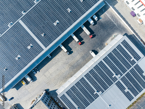 Wallpaper Mural Aerial View of Factory with Solar Panels and Transport Trucks Torontodigital.ca