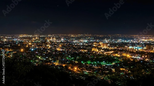 A breathtaking panoramic night view of Hyderabad, showcasing its modern skyline and historic landmarks glowing in city lights.