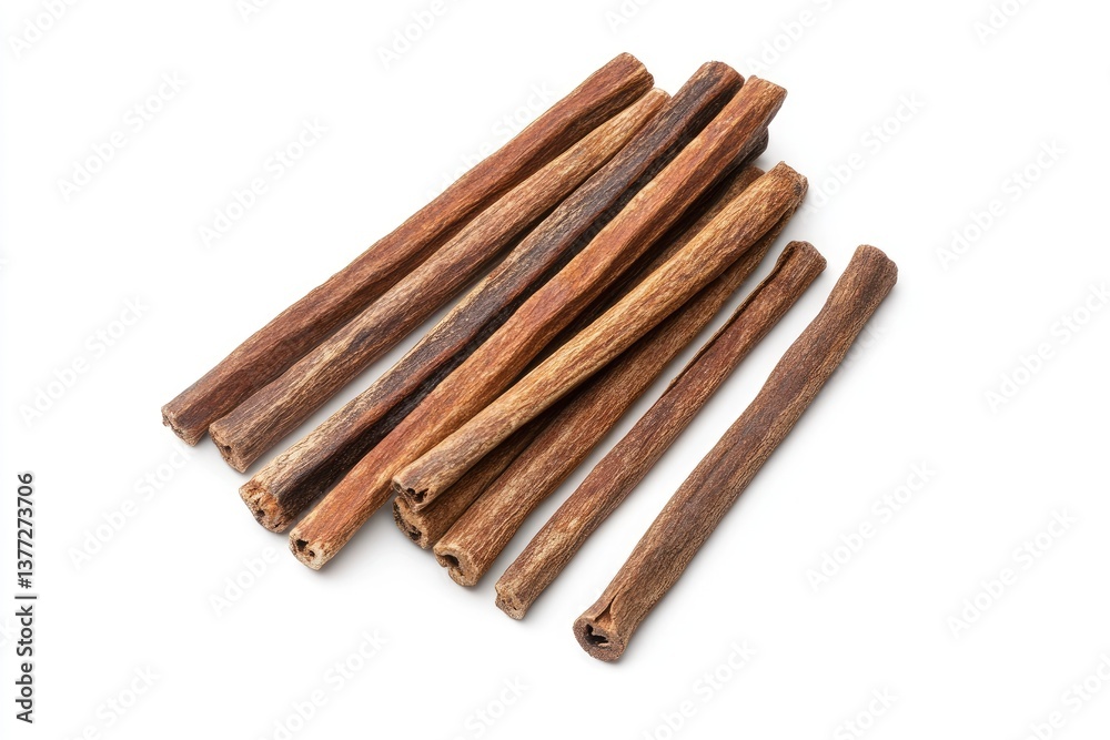 Dried meat sticks for pets. Several sticks are layered, showing a light brown color and a slightly rough, natural texture Dried meat sticks for pets. Several sticks are layered, showing a light brown color and a slightly rough, natural texture