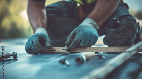 A construction worker securing a roof beam with bolts. Featuring strength and teamwork