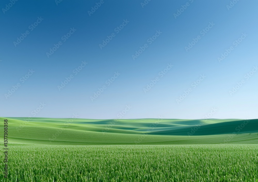 Naklejka premium A serene landscape featuring rolling green hills under a clear blue sky, evoking tranquility and natural beauty.