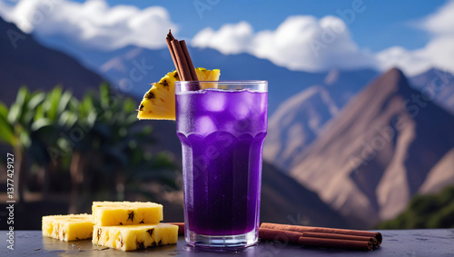Peru – Chicha Morada: A deep purple glass of chicha morada, a Peruvian drink made from purple corn, served with pineapple and cinnamon sticks, against a backdrop of the Andes mountains. photo