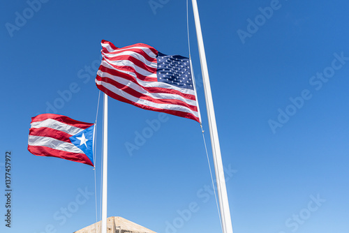 united states and Puerto Rico Flag flying at half mast