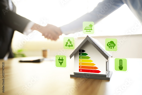 Energy-saving homes, energy efficiency concepts, eco-friendly home improvements, cost savings, low-energy eco-friendly homes, green handshake.
