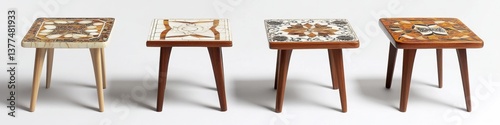 Four patterned mosaic tile end tables on white background