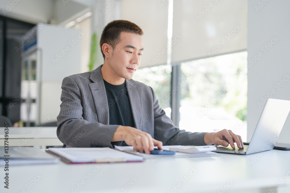 Young Business man holding Smartphone working mobile devices. cell telephone technology e-commerce smartphone for business work