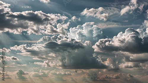 Dramatic clouds in the sky, bright and shadowy, white and grey, weather concept