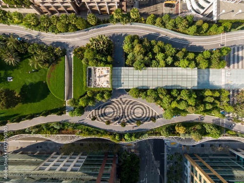 Aerial view of Salesforce Park in San Francisco, California, USA. People are walking and relaxing in the park, enjoying the green space and urban oasis.