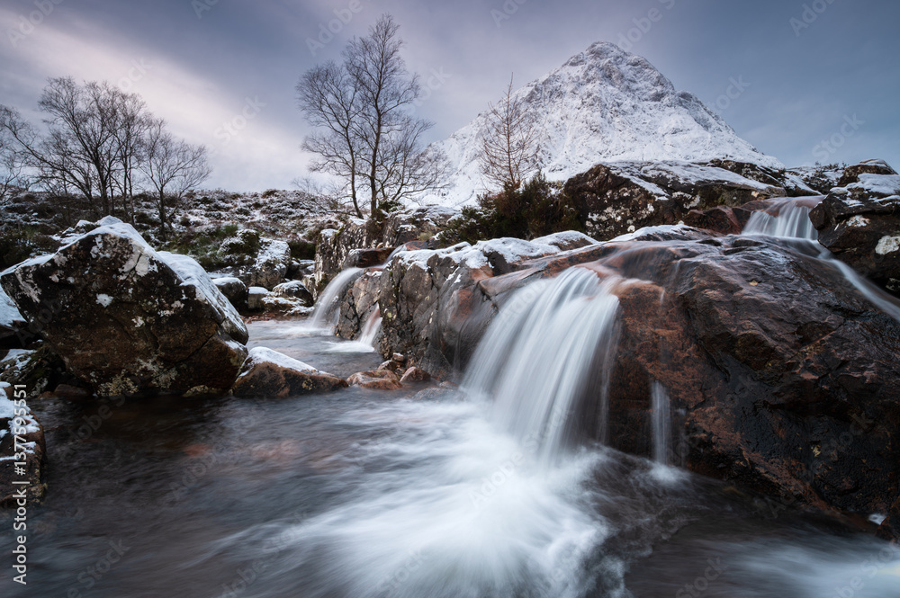 Scottish landscape with mountain and waterfall Scottish landscape with mountain and waterfall